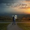 Man at crossroads deciding which way to go